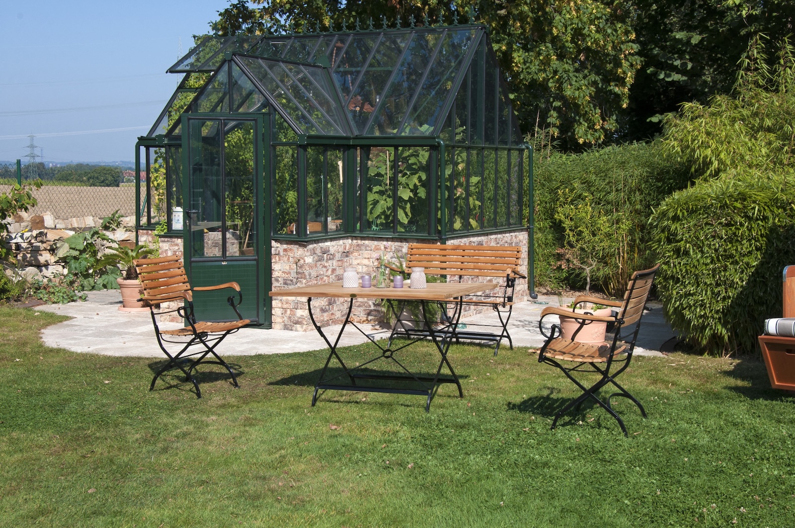 Sonnenpartner Klappsessel Oxford Teakholz und Eisen schwarz Gartenstuhl klappbar